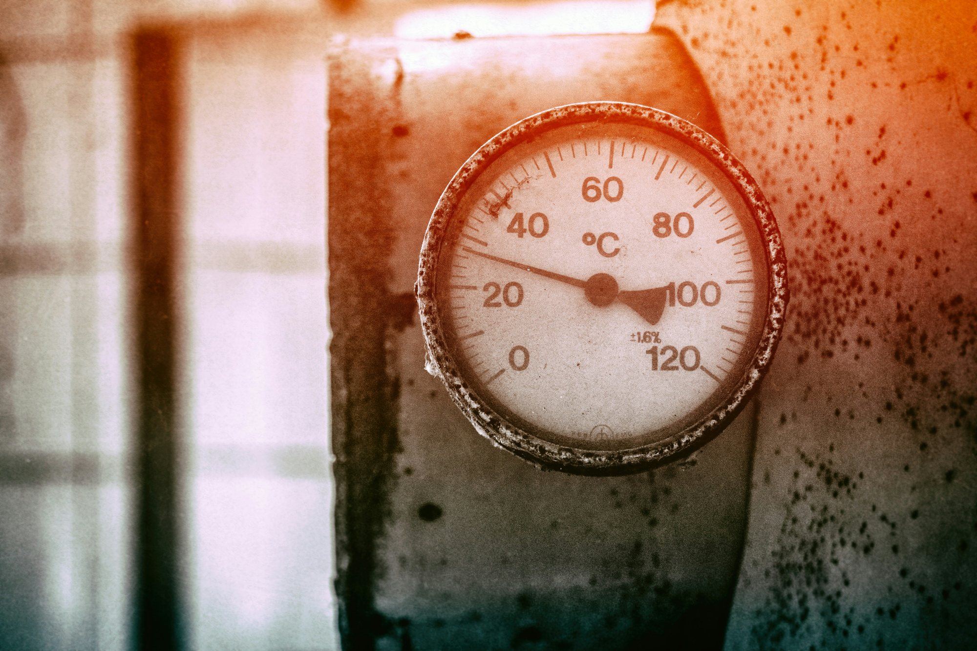Temperature gauge on an industrial hot water pipe